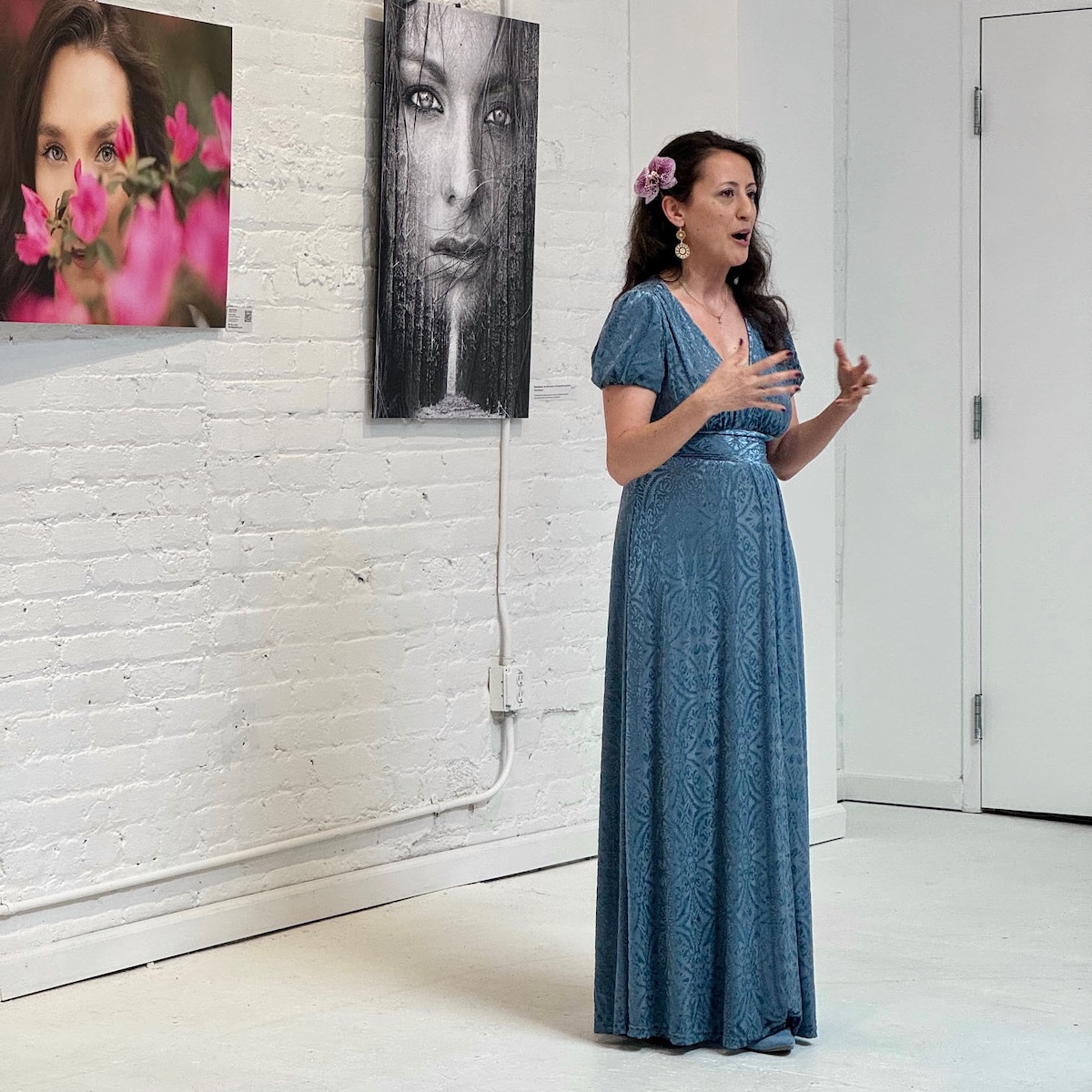 Artist in Gallery Speaking to a Group